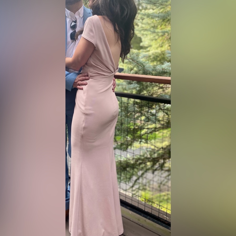 Light pink bridemaid dress with Plunging back. Size 8.